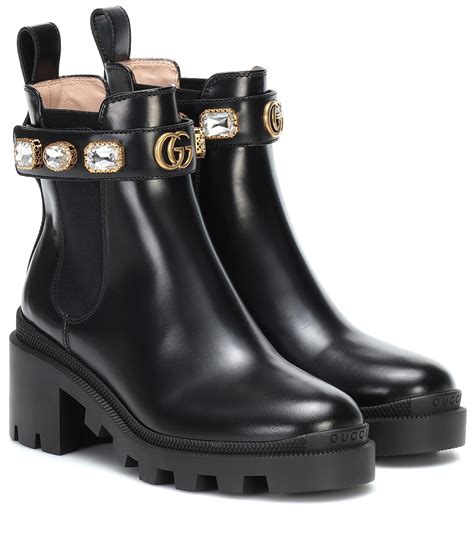 gucci black lace up boots with white heart on sole|Gucci designer ankle boots.